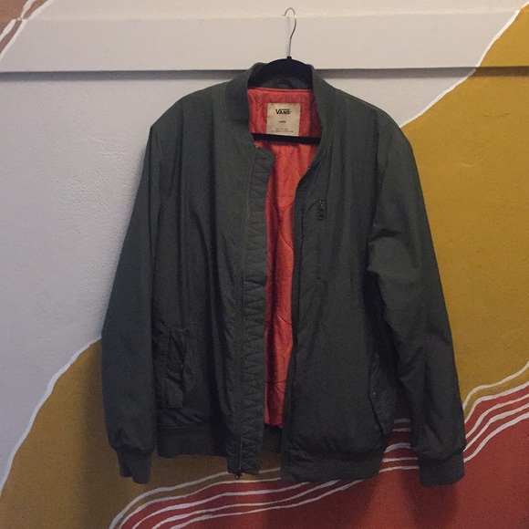 green jacket with orange inside